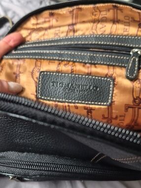 Tignanello Black Pebbled Leather Back Pack with Gold Printed Lining